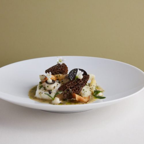 A delicate dish in a large bowl served at Michael Caines new restaurant at The Stafford