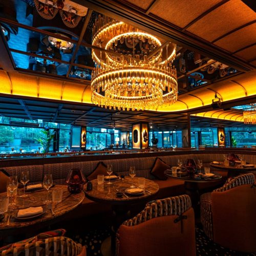 The main room at Salvaje with a grand chandelier hanging from the centre of the ceiling