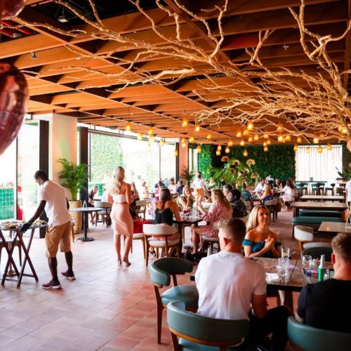 Bla Bla Dubai restaurant area populated by guests enjoying food and drinks