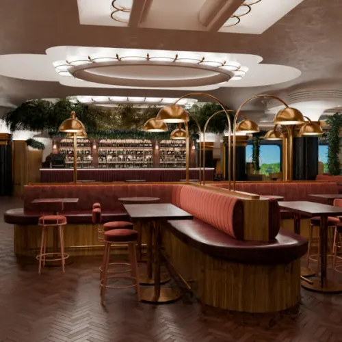 The main bar at Clays Soho with a mixture of booth seats and stools for guests