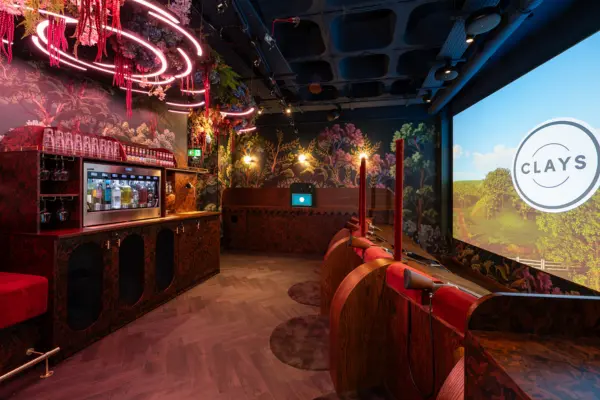 The private room, The Hide, at Clays Soho with its own private bar and shooting simulation