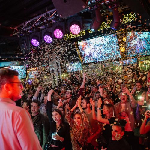A party and celebration at Box Piccadilly, where the crowd are cheering and being covered in confetti