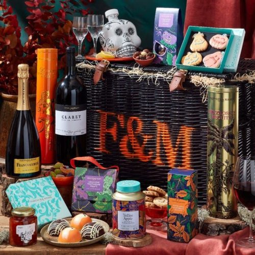 The Halloween Hamper from Fortnum & Mason with the contents arranged around the hamper