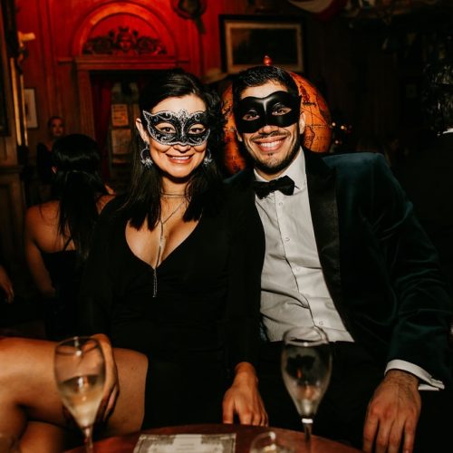 Guests dressed in masks at the masquerade ball at Mr Fogg's in Mayfair, a creative party for new years eve