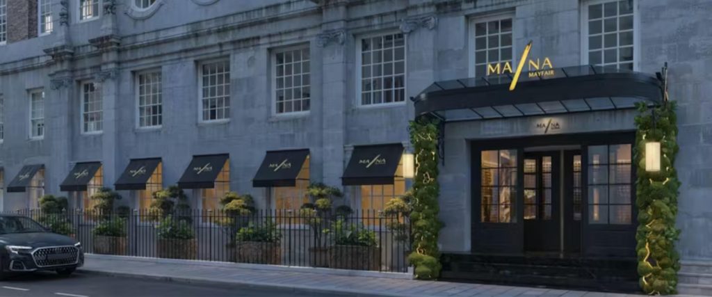The outside of MA/NA at night before it opens in January