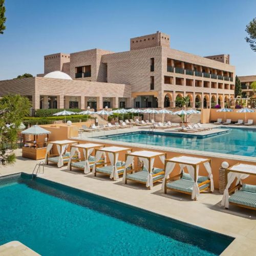 The pool area at Gran Marbella, with sun beds and bars around the resort