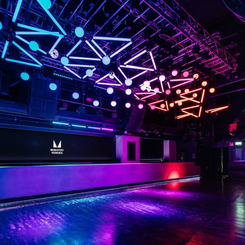 An event space in Ministry of Sound, that is decorated with neon lights