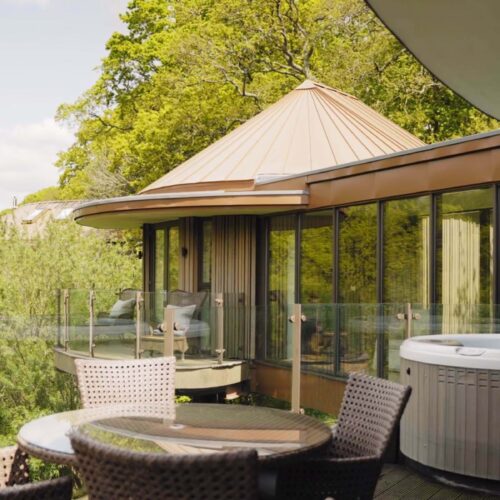 One of the balconies on the tree houses at Chewton Glen, where guests can feel excluded and private during their stay