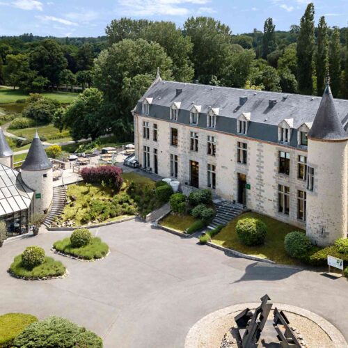 An aerial view of a white and grey coloured Châteauform' estate