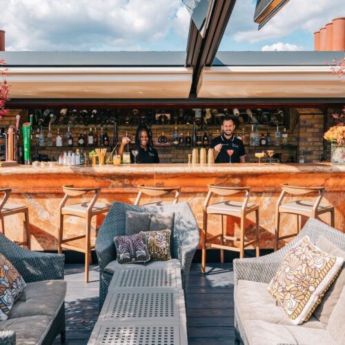 Stanley's Rooftop at The Chesterfield Mayfair by day, with relaxed seating