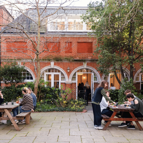 The main courtyard at The Garden House, with casual seating