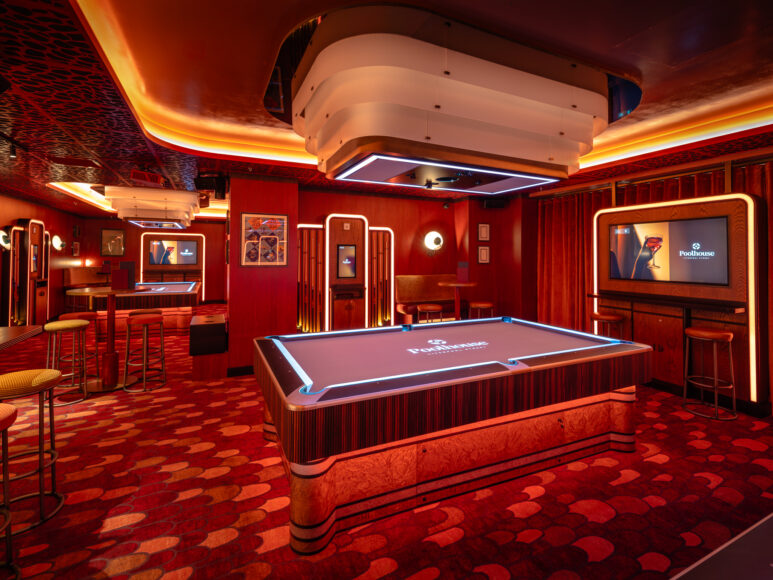 One of the private rooms at Poolhouse with a central pool table, perfect for team building for groups of all sizes