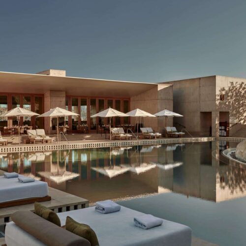 The pool at Amangiri with cabanas and sun loungers