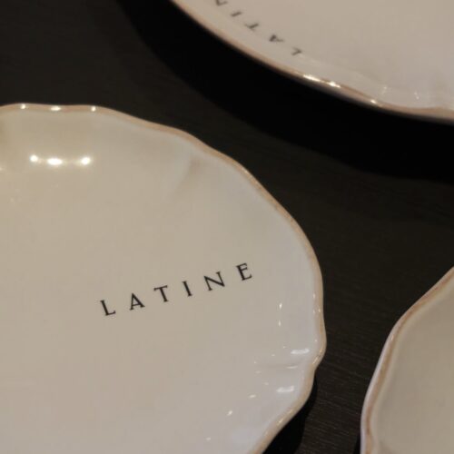 Branded plated at Latine, with their logo delicately printed on one side
