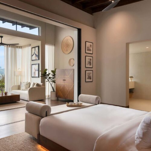 Inside one of the rooms at Uga Ghiri, with large open windows and panoramic views