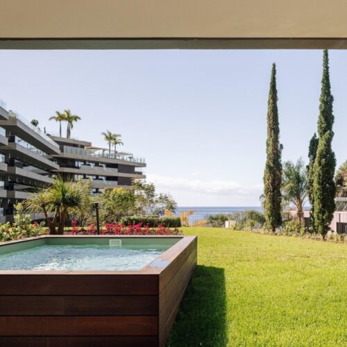 A private pool on the grass at Saccharum, overlooking the main hotel