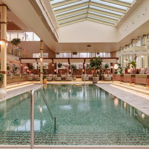 The indoor pool at Hjortviken Country Club, which has a glass roof to allow sunlight through