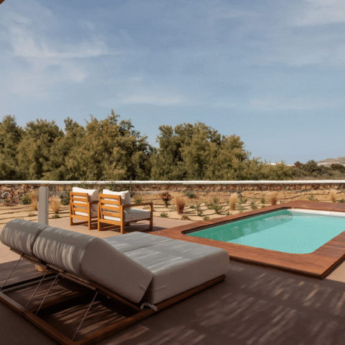 A private balcony in a room at Laguna Coast Resort, with its own private pool and deck chairs