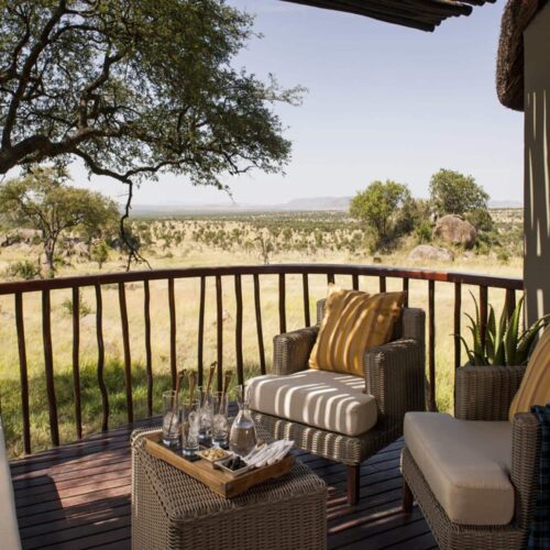A balcony with a view of the game reserve at Four Seasons Safari Lodge Serengeti
