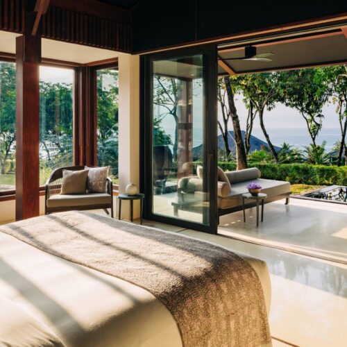 A double room in ÀNI Sri Lanka, with big windows opening out to a private courtyard