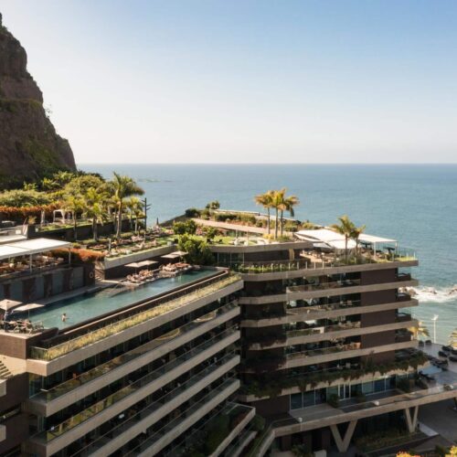 The view of Saccharum from above, showcasing it's rooftop infinity pool and restaurant area