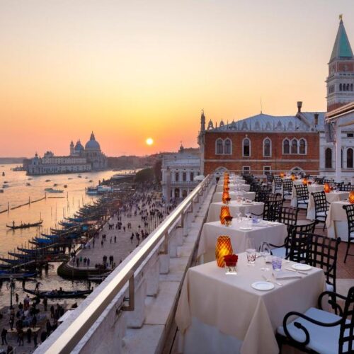 The beautiful rooftop overlooking a sunset in Venice at Danieli, Venezia, A Four Seasons Hotel